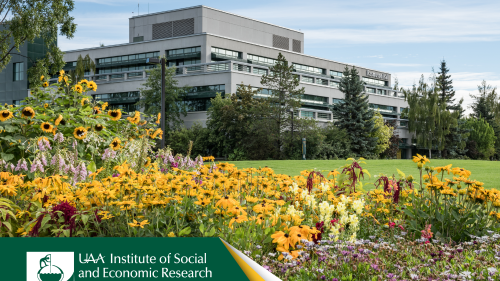 An academic building behind a row of flowers. Text on image: UAA Institute of Social and Economic Research